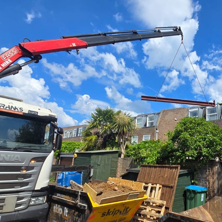 Franks Steel crane lifting structural steel beam at residential project in Croydon BR4