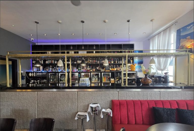 Bespoke suspended steel wine rack fabricated and installed by Franks Steel in Kent restaurant