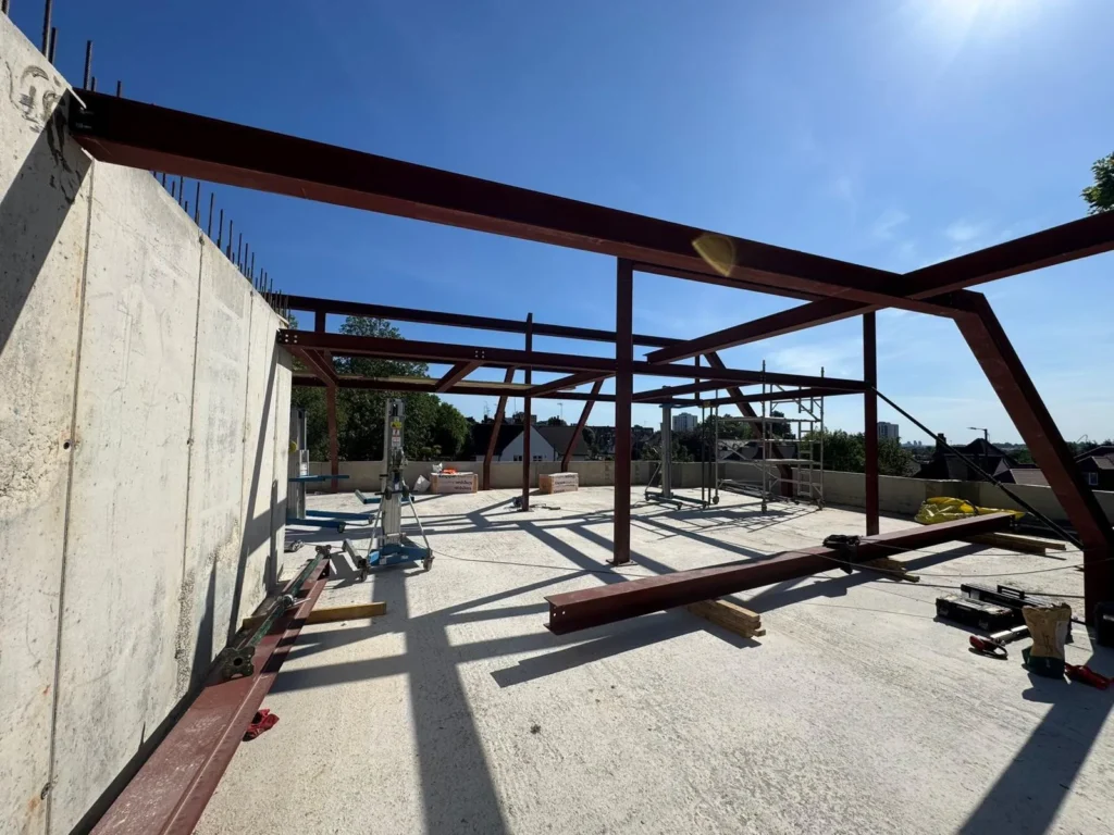 Structural steel roof frame supplied by Franks Steel for a residential construction project in North London.
