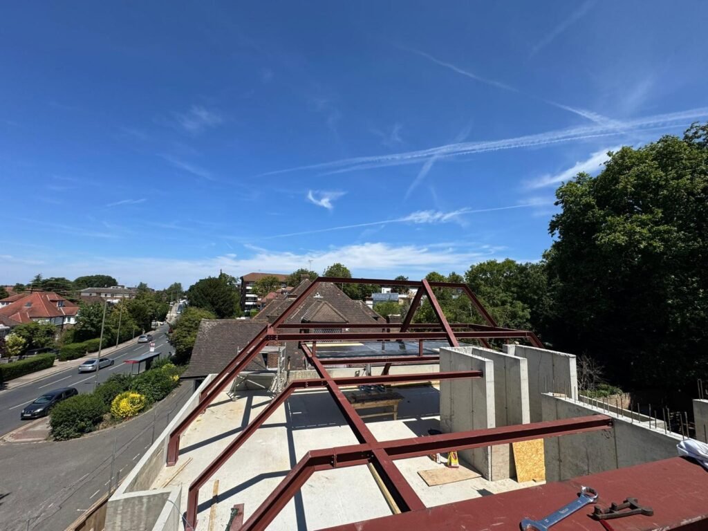 Structural steel roof frame installed by Franks Steel for a residential construction project in North London.