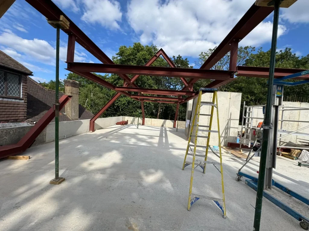 Structural steel roof frame fabricated and installed by Franks Steel for a residential development in North London.
